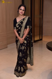 actress vaishnavi chaitanya sweet looks in a black saree