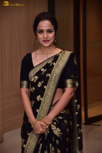 actress vaishnavi chaitanya sweet looks in a black saree
