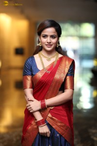 actress Vaishnavi Chaitanya pretty in a red half saree