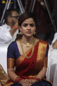 actress Vaishnavi Chaitanya pretty in a red half saree