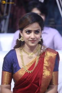 actress Vaishnavi Chaitanya pretty in a red half saree