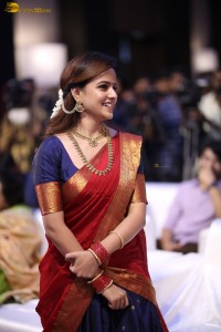 actress Vaishnavi Chaitanya pretty in a red half saree