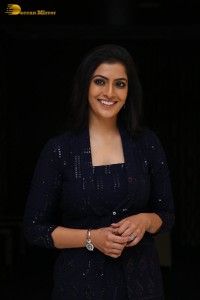 Indian Actress Varalaxmi Sarathkumar in a black dress