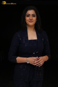 Indian Actress Varalaxmi Sarathkumar in a black dress