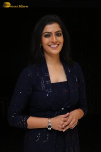 Indian Actress Varalaxmi Sarathkumar in a black dress