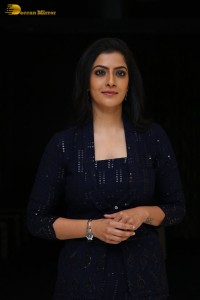 Indian Actress Varalaxmi Sarathkumar in a black dress