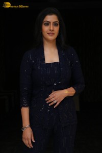 Indian Actress Varalaxmi Sarathkumar in a black dress