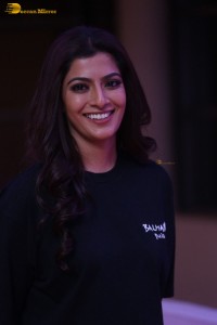 Indian actress varalaxmi sarathkumar in black t-shirt and denim jeans