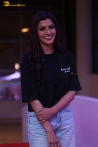 Indian actress varalaxmi sarathkumar in black t-shirt and denim jeans