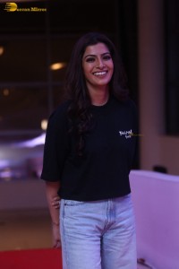 Indian actress varalaxmi sarathkumar in black t-shirt and denim jeans