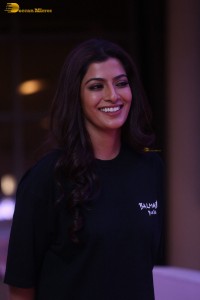 Indian actress varalaxmi sarathkumar in black t-shirt and denim jeans