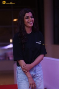 Indian actress varalaxmi sarathkumar in black t-shirt and denim jeans