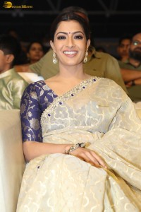 actress Varalaxmi Sarathkumar beautiful in a light yellow saree