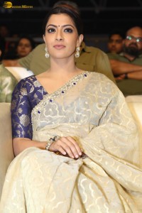 actress Varalaxmi Sarathkumar beautiful in a light yellow saree