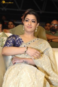 actress Varalaxmi Sarathkumar beautiful in a light yellow saree