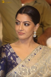 actress Varalaxmi Sarathkumar beautiful in a light yellow saree