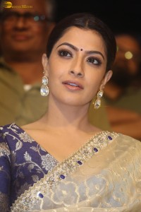 actress Varalaxmi Sarathkumar beautiful in a light yellow saree