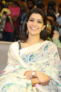 actress Varalaxmi Sarathkumar gorgeous in a white saree with blue pattern