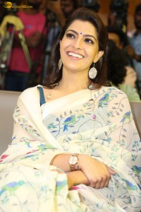 actress Varalaxmi Sarathkumar gorgeous in a white saree with blue pattern