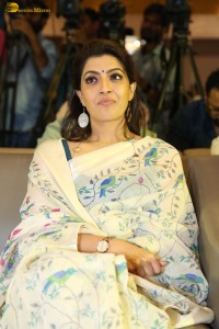 actress Varalaxmi Sarathkumar gorgeous in a white saree with blue pattern