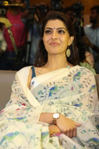 actress Varalaxmi Sarathkumar gorgeous in a white saree with blue pattern