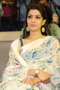 actress Varalaxmi Sarathkumar gorgeous in a white saree with blue pattern