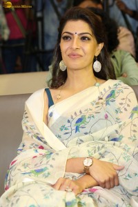 actress Varalaxmi Sarathkumar gorgeous in a white saree with blue pattern