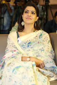 actress Varalaxmi Sarathkumar gorgeous in a white saree with blue pattern