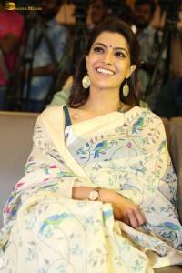 actress Varalaxmi Sarathkumar gorgeous in a white saree with blue pattern