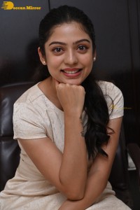 Telugu Actress Varsha Bollamma in a white dress