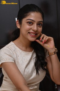 Telugu Actress Varsha Bollamma in a white dress