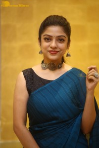 Telugu actress varsha bollamma in a blue saree