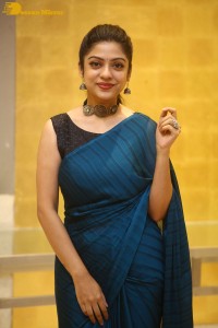 Telugu actress varsha bollamma in a blue saree