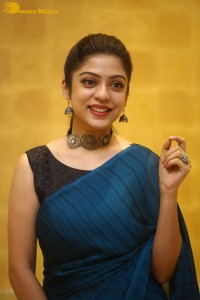 Telugu actress varsha bollamma in a blue saree
