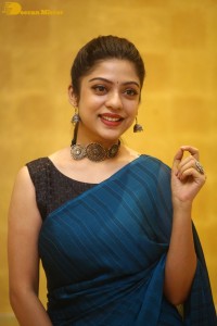 Telugu actress varsha bollamma in a blue saree