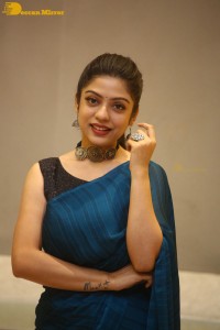Telugu actress varsha bollamma in a blue saree
