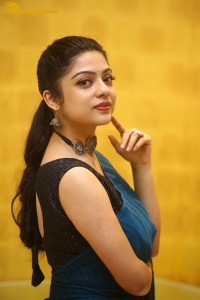 Telugu actress varsha bollamma in a blue saree