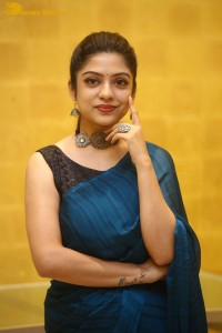 Telugu actress varsha bollamma in a blue saree