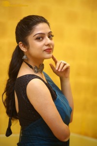 Telugu actress varsha bollamma in a blue saree