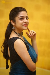 Telugu actress varsha bollamma in a blue saree