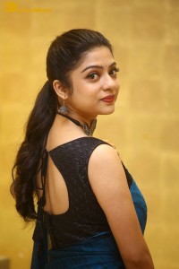 Telugu actress varsha bollamma in a blue saree