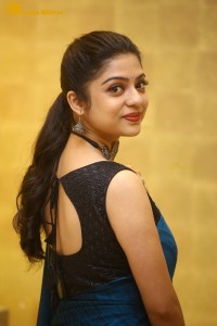 Telugu actress varsha bollamma in a blue saree