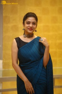 Telugu actress varsha bollamma in a blue saree