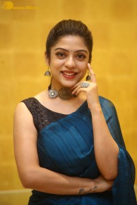 Telugu actress varsha bollamma in a blue saree