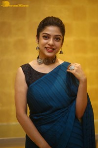 Telugu actress varsha bollamma in a blue saree