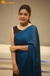 Telugu actress varsha bollamma in a blue saree