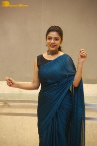 Telugu actress varsha bollamma in a blue saree