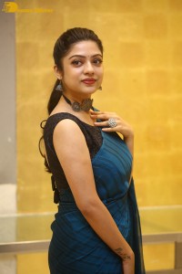Telugu actress varsha bollamma in a blue saree