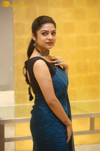 Telugu actress varsha bollamma in a blue saree