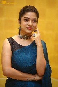 Telugu actress varsha bollamma in a blue saree